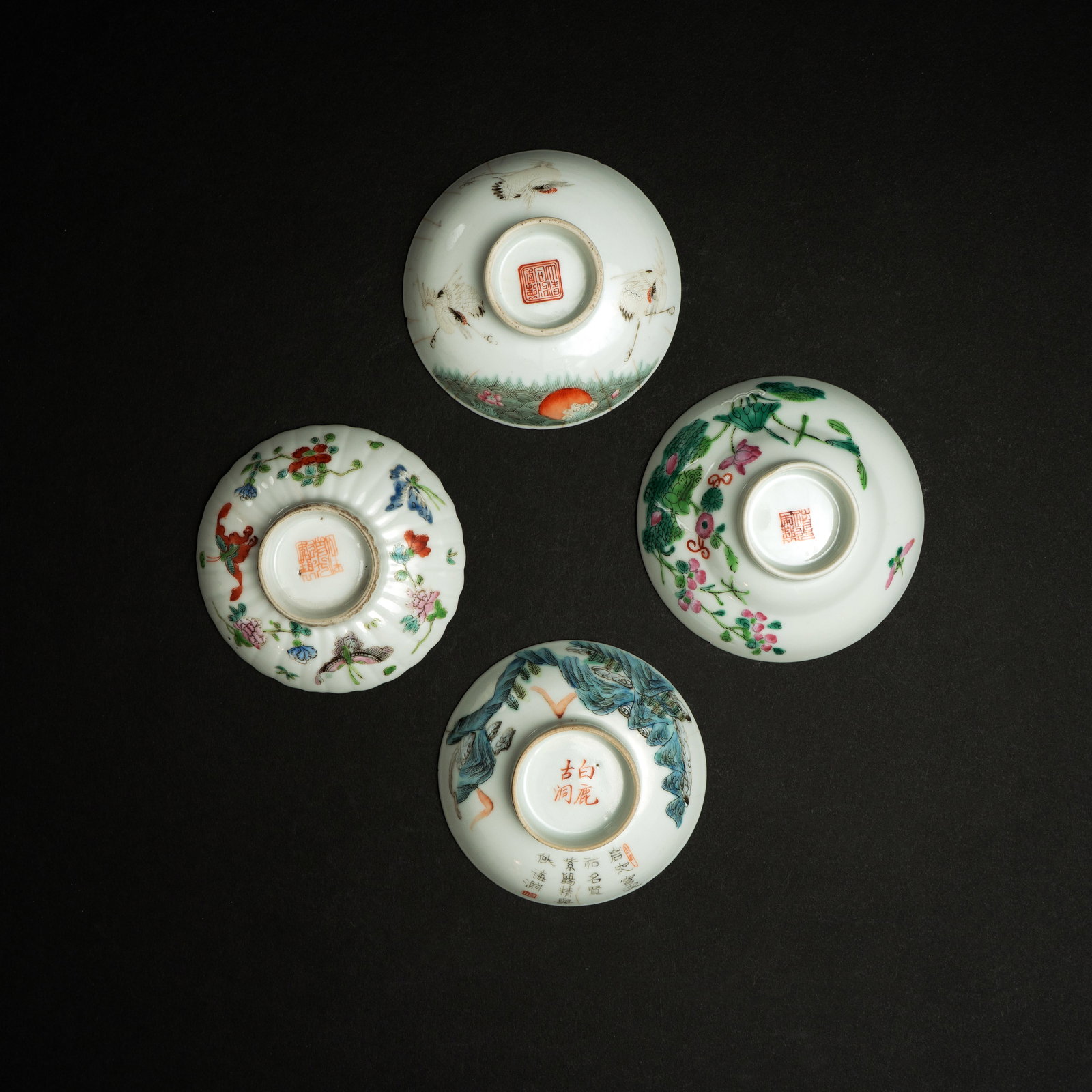 A GROUP OF FOUR FAMILLE ROSE WINE CUP COVERS LATE QING DYNASTY / REPUBLIC PERIOD 晚清: A GROUP OF FOUR FAMILLE ROSE WINE CUP COVERSLATE QING DYNASTY / REPUBLIC PERIOD晚清至民国 粉彩小杯盖一组ESTIMATE: $300– $5