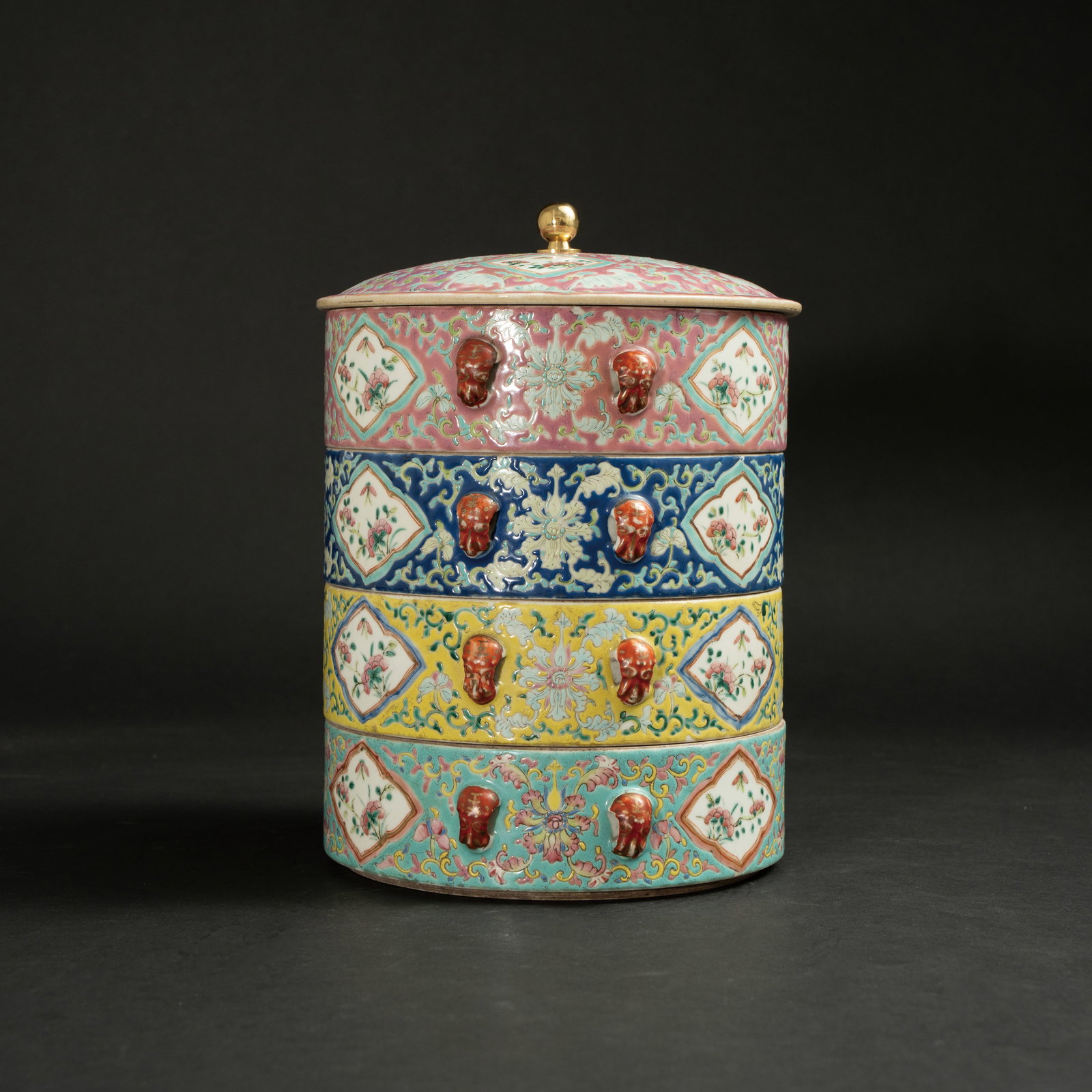 A FAMILLE ROSE MULTI-COLORED GROUND FOUR-TIERED CYLINDRICAL BOX AND COVER LATE QING DYNASTY / (1 of 19)