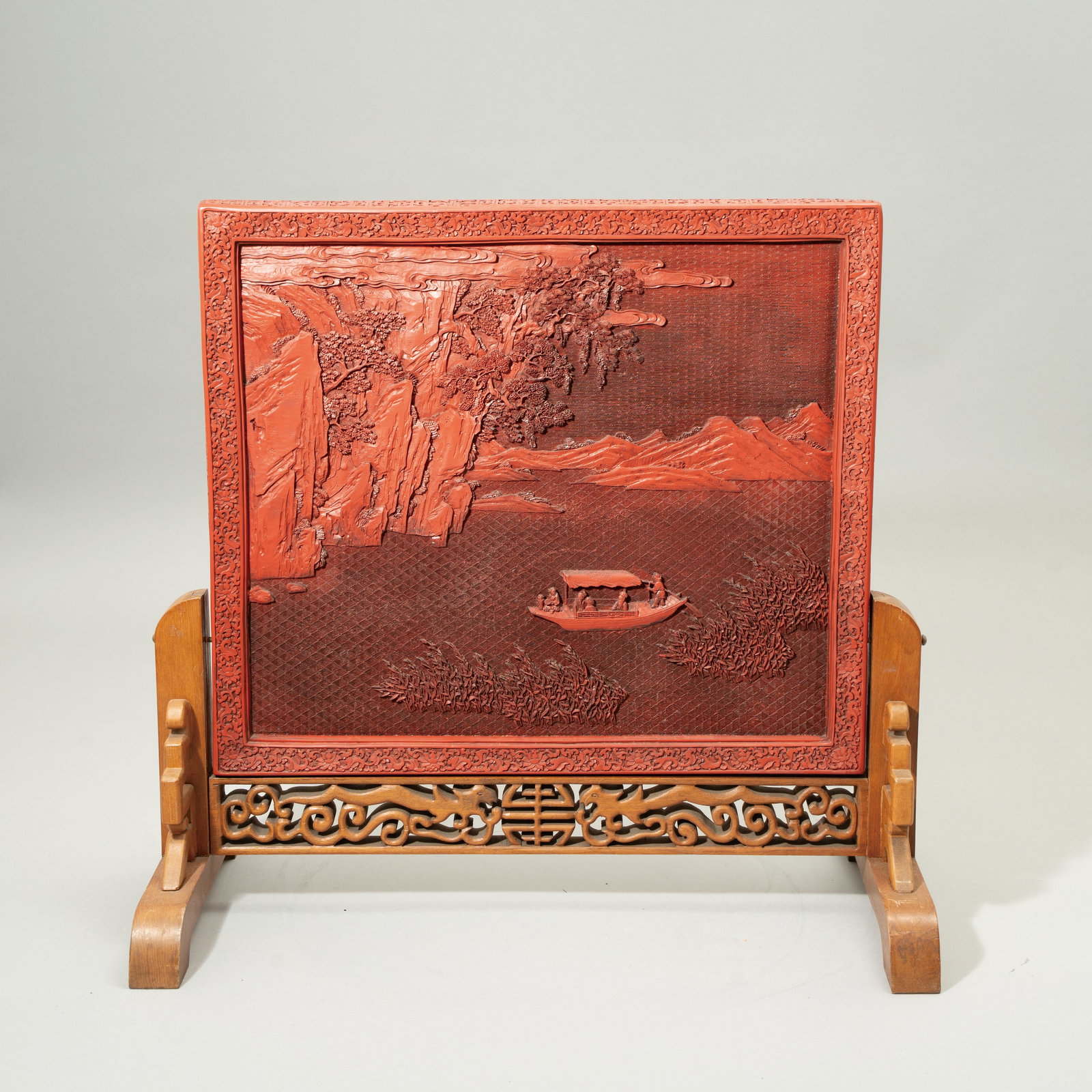 A RARE LARGE CINNABAR LACQUER 'DRAGON AND LANDSCAPE' SCREEN QING DYNASTY (1644–1911) 清: A RARE LARGE CINNABAR LACQUER 'DRAGON AND LANDSCAPE' SCREENQING DYNASTY (1644–1911)清 剔红龙纹与山水人物图插屏Estima