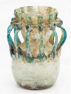 Masterpiece Thread Decorated Jar. Byzantine Period, 5-6th Century C.E. 11.2 cm: Masterpiece Thread Decorated Jar. Byzantine Period, 5-6th Century C.E. 11.2 cm. Blue-green with emerald-like iridescence. The neck threads on this fabulous vessel was formed with one thick continuous