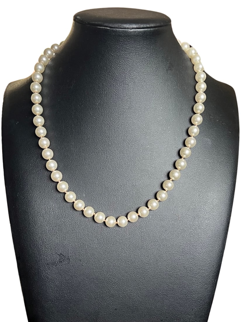 Exquisite Grade AAA Akoya Pearl Single Knotted Strand Necklace: This Exquisite Grade AAA Akoya Pearl Single Knotted Strand Necklace has a gorgeous 10 karat yellow gold, ornate, gold filigree hook, push-lock clasp closure in the back. The pearls are lusterous beyon