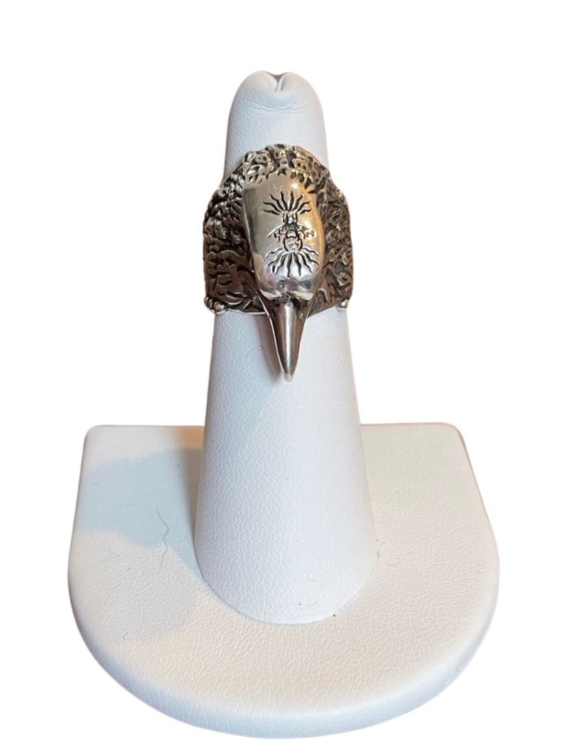 Gucci Sterling Silver L Eagle Ring: Elevate your accessories game with this iconic Gucci Sterling Silver L Eagle Ring. This ring features the signature double G logo and an eagle motif, representing strength and freedom. Crafted from hi