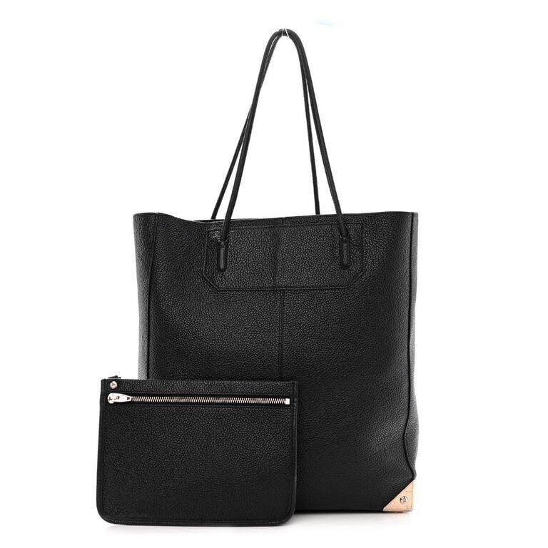 Alexander Wang Pebbled Calfskin Large Prisma Skeletal Tote Black Rose Gold Hardware: This chic Alexander Wang Pebbled Calfskin Large Prisma Skeletal Tote Black Rose Gold Hardware is crafted of highly textured cowhide leather in black. The bag features leather thin leather strap handle