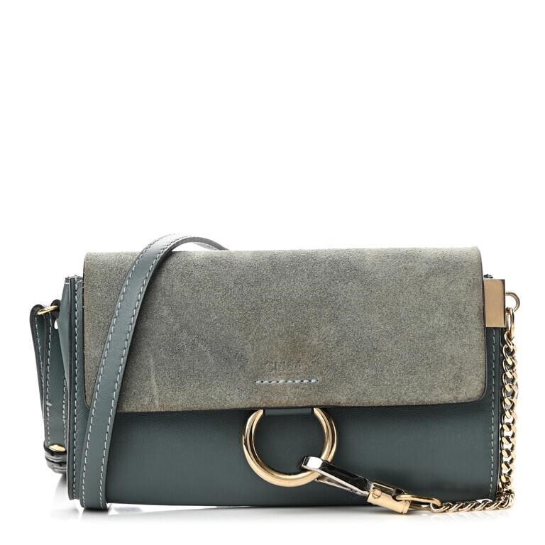 Chloe Suede Calfskin Faye Cloudy Blue Purse: This exquisite accessory is a harmonious blend of style and sophistication, showcasing Chloe's unwavering commitment to craftsmanship and design. The shoulder bag is meticulously crafted from fine smo