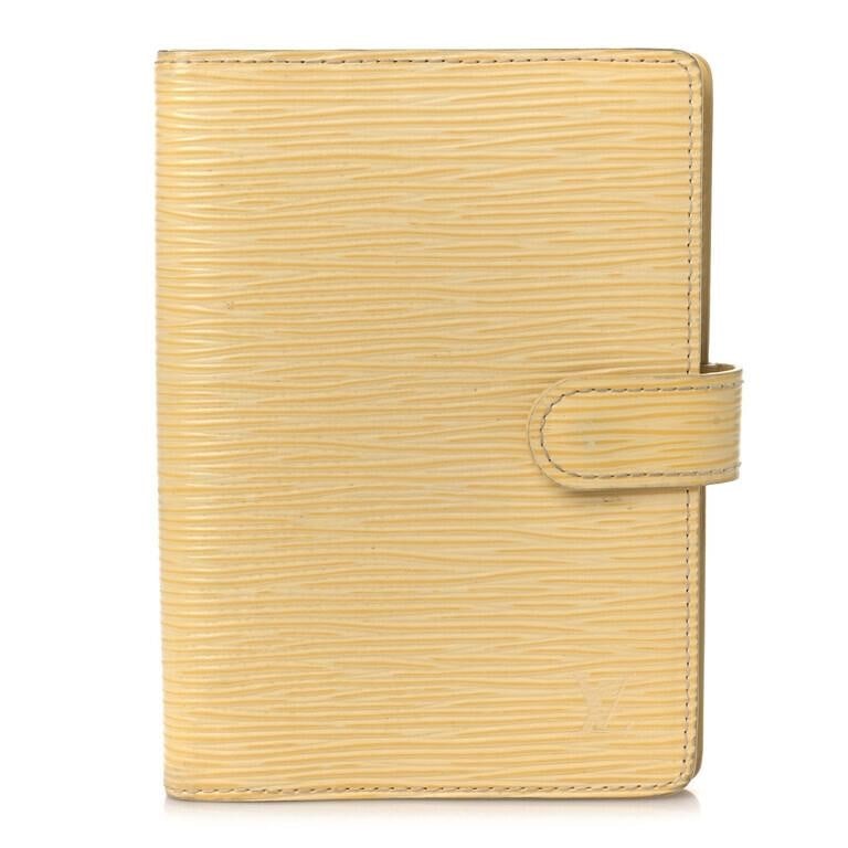 Louis Vuitton Creme Epi Small Ring Agenda Cover: This exquisite and sophisticated Louis Vuitton Epi Small Ring Agenda Cover is a must-have for luxury collectors and fashion enthusiasts alike. Crafted from the iconic signature textured epi leather in