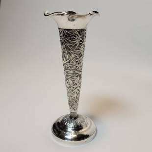 Chinese Export Silver Trumpet Vase Luen Wo c.1890: Chinese export silver trumpet vase by Luen Wo, Shanghai c. 1890, repousse with bamboo and birds, stepped circular foot, rim with geometric art deco design, weight 141.5gm, height 18cm, diameter 7cm. 