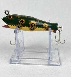 John Nash fishing lure: Painted wooden fishing lure by John Nash. Signed under and dated '01. Condition: Presenting nicely. Dimensions: L 3"