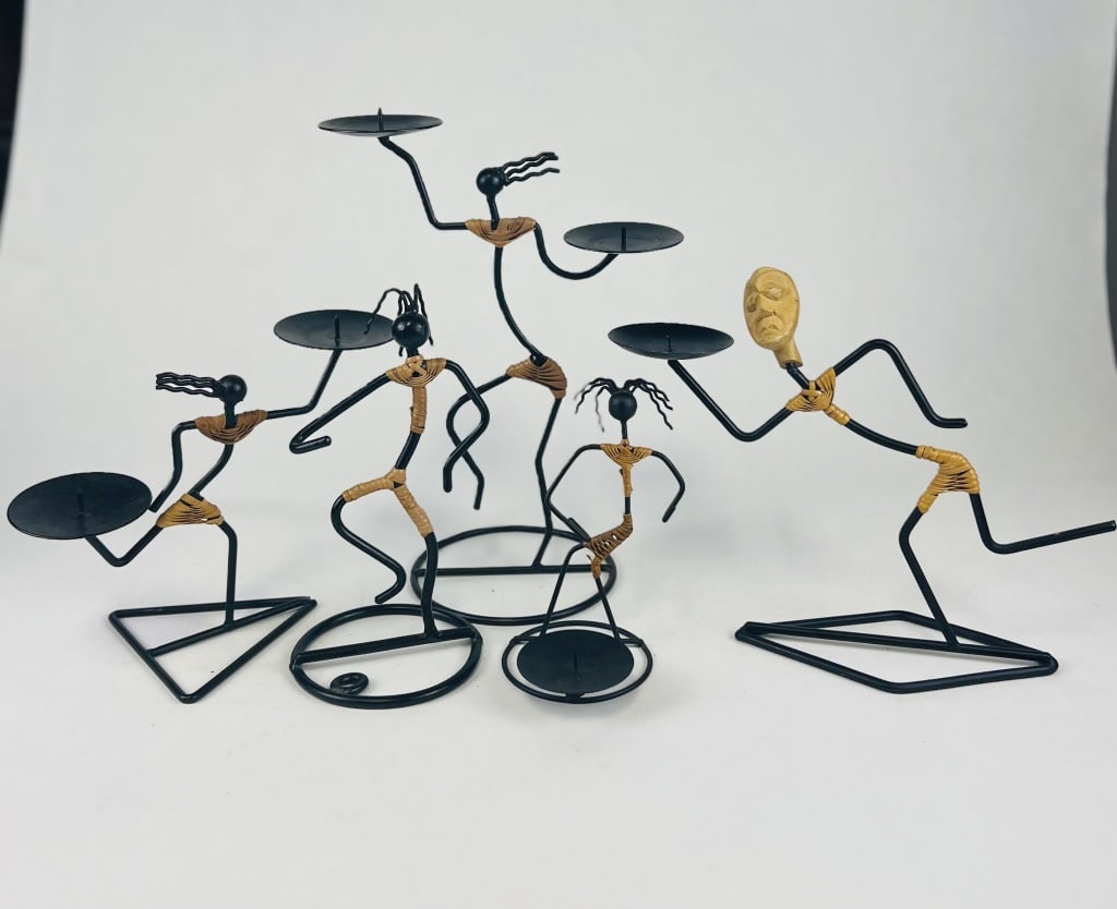 Laurdis Lonborg band: (5) piece band by Danish designer Laurdis Lonborg. Wood and metal. Dimensions: Largest: H 9" x W 10" Condition: Presenting nicely.