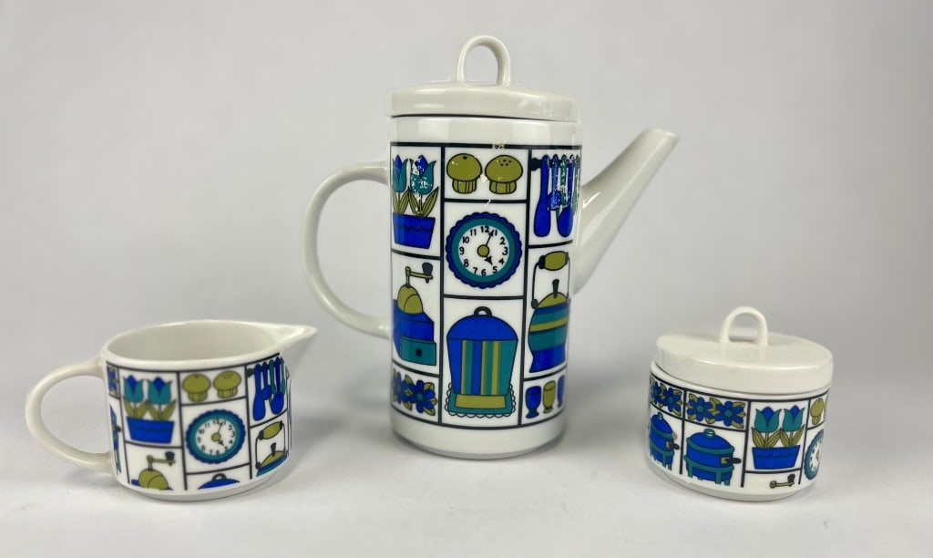 Mid-Century Cocoa/Coffee Set: No makers marks. including coffee or cocoa pot, covered sugar and creamer. Dimensions: H 8" x W 8" Condition: Some tape residue on pot.