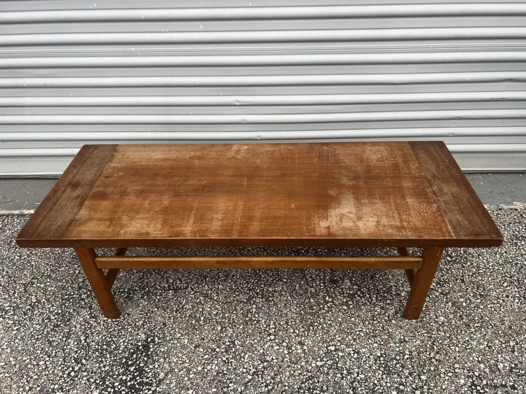 Lane coffee table: Coffee or occasional table by Lane. Nice modern design. Dimensions: H 15" x W 50" x D 19" Condition: Needs refinishing, one leg missing a piece, sturdy.