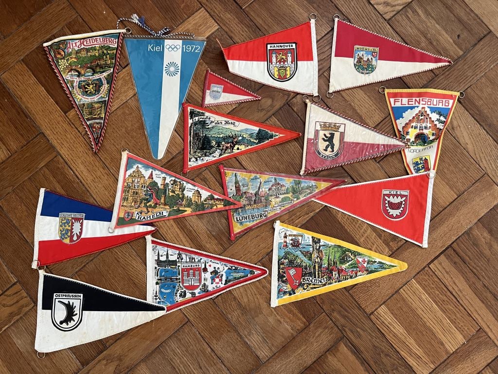 Vintage pennant flags- European: Dimensions: Largest: L 9.5" Condition: Some folds and bends.