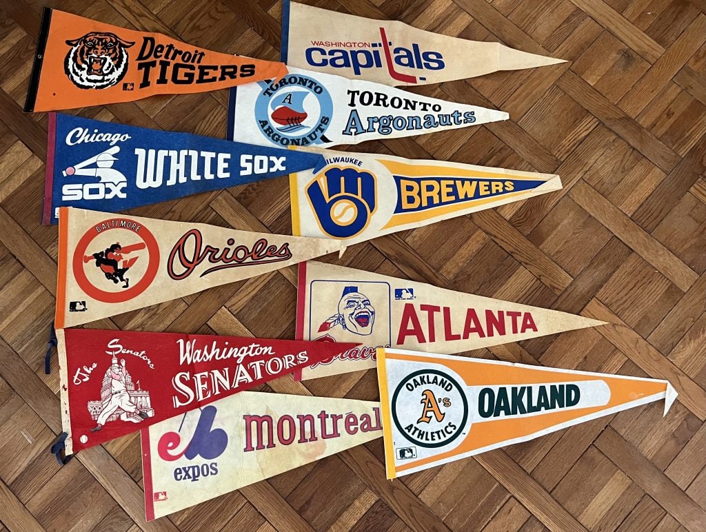 Vintage pennant flags- Sports: Some older flags. Dimensions: Longest: L 29" Condition: As shown, some foxing and bending.