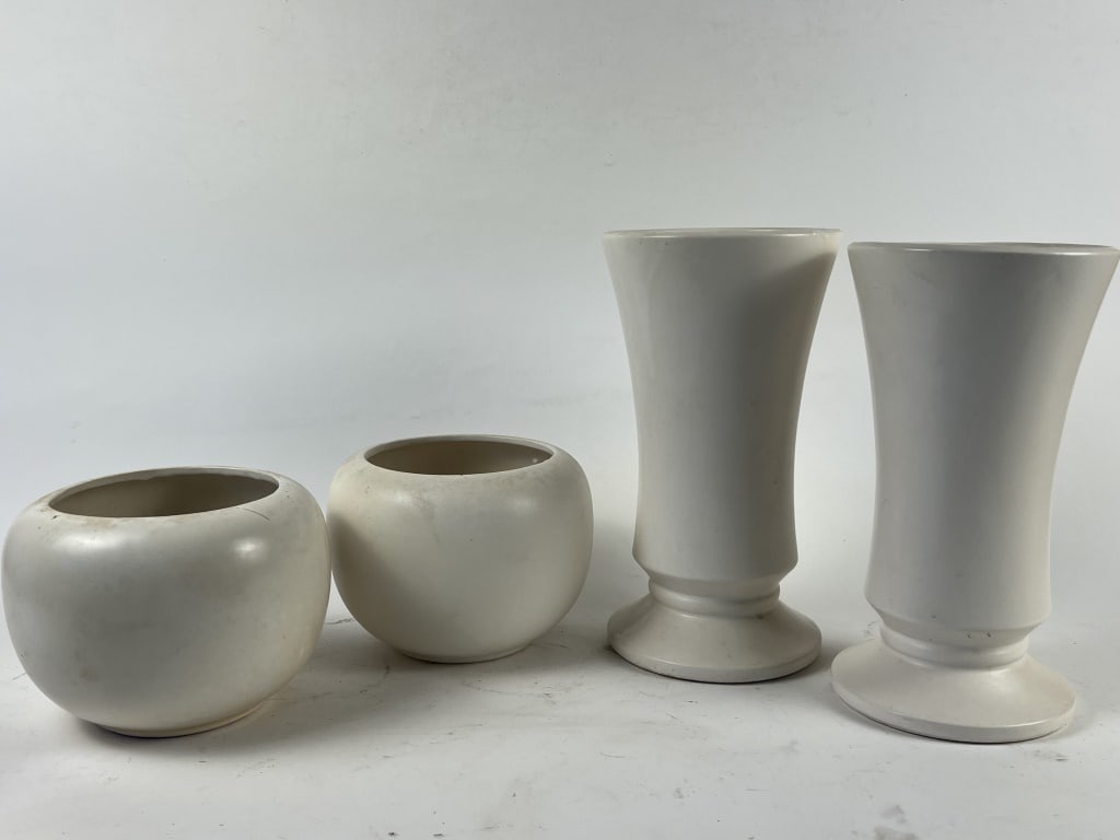 2 Pairs McCoy Floraline vases: Cream color, tall vases and bulbous vases. Dimensions: Tallest: H 11" x Dia: 6" Condition: Shorter vases very dirty, some crazing.