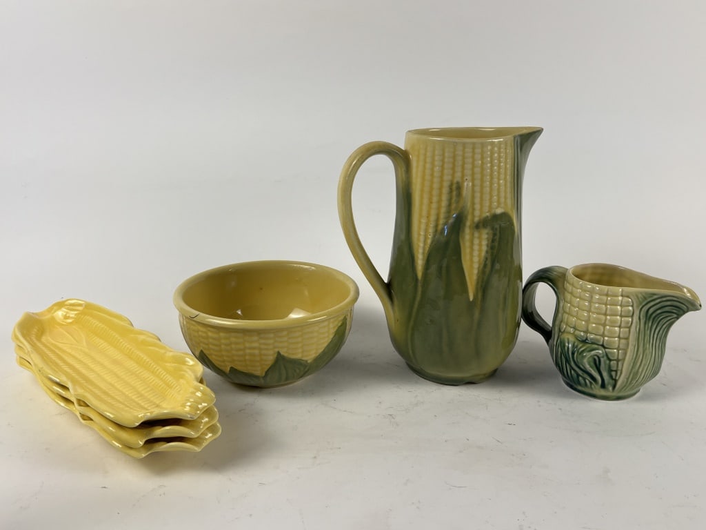 Shawnee corn grouping: Marked Shawnee and Calif. USA. Dimensions: Pitcher H 8.25" x W 6.25" Condition: Some crazing to interiors. Otherwise normal light use and age.