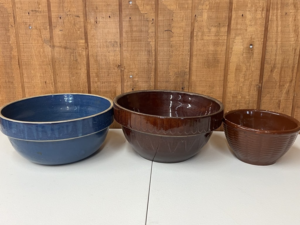 (3) Stoneware mixing bowls: Clay CIty Pottery and the other two unmarked. Dimensions: Brown: Dia: 10.5" Condition: minor edge chips and wear.