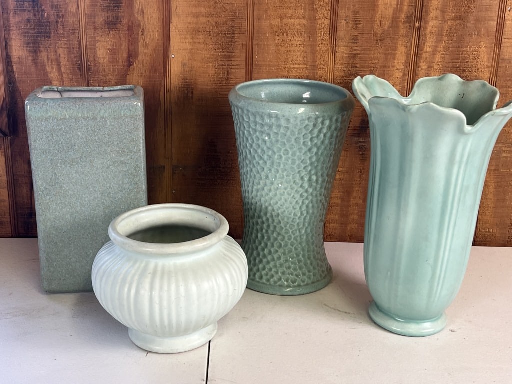(4) American pottery turquoise vases: Stangl, etc Dimensions: Tallest: H 10" x W 6.5" Condition: Tallest with some small chips and residue that should clean off.