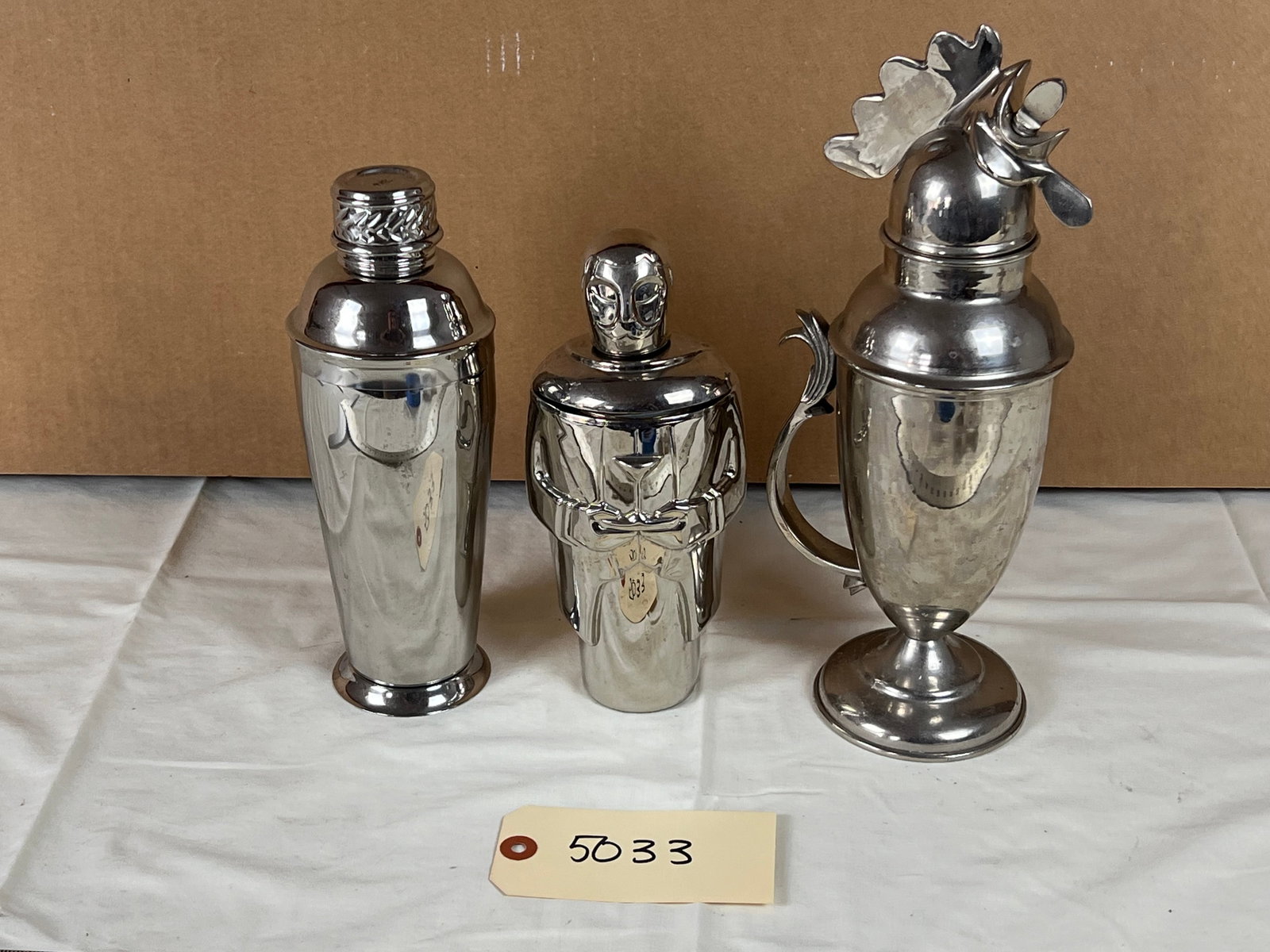 Cocktail shakers including vintage: A rooster, A Ralph Lauren and a butler. All used, showing minor use.