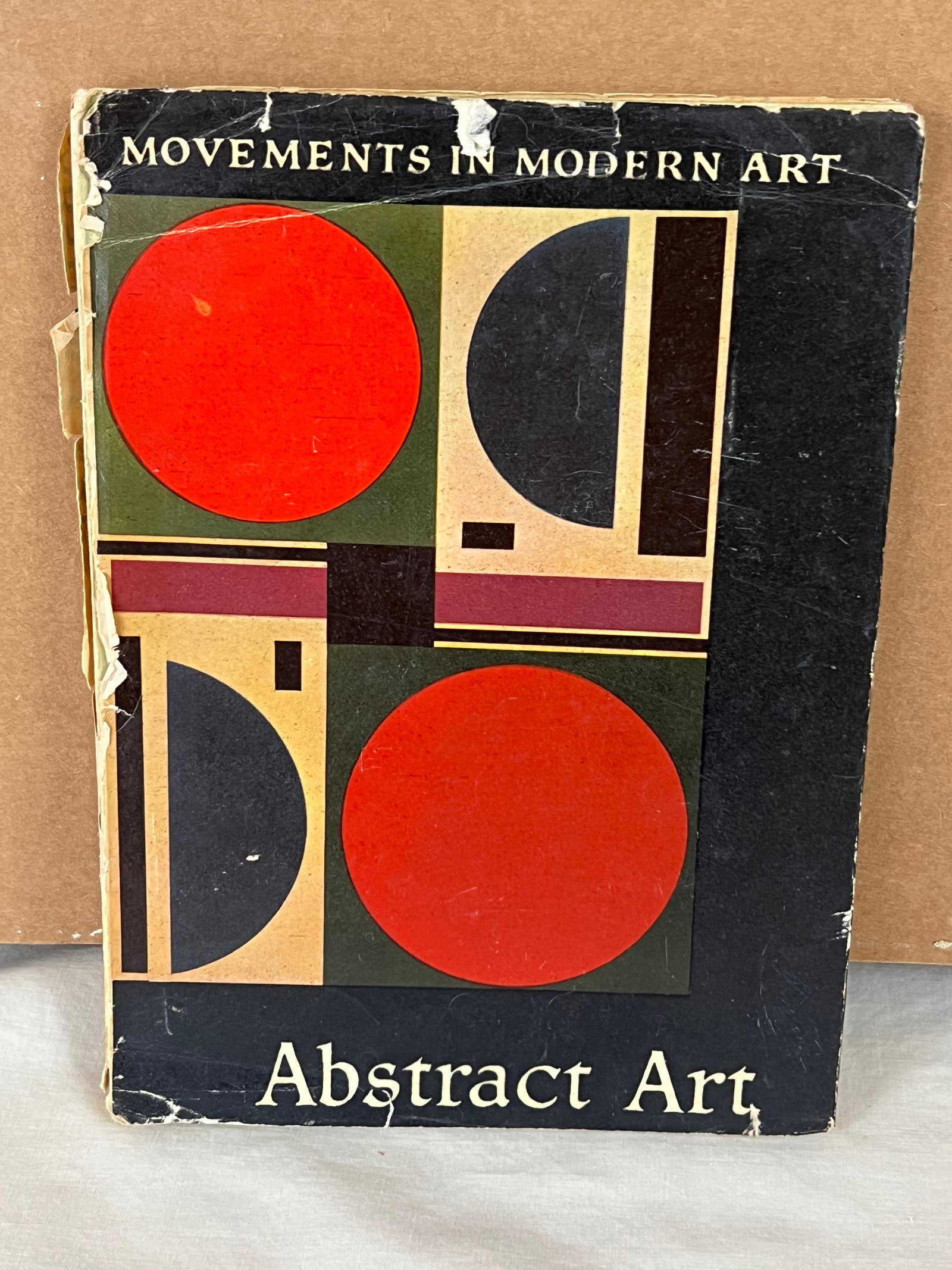 Movements in Modern Art: Hardcover, Abstract Art. Showing signs of age and use.m