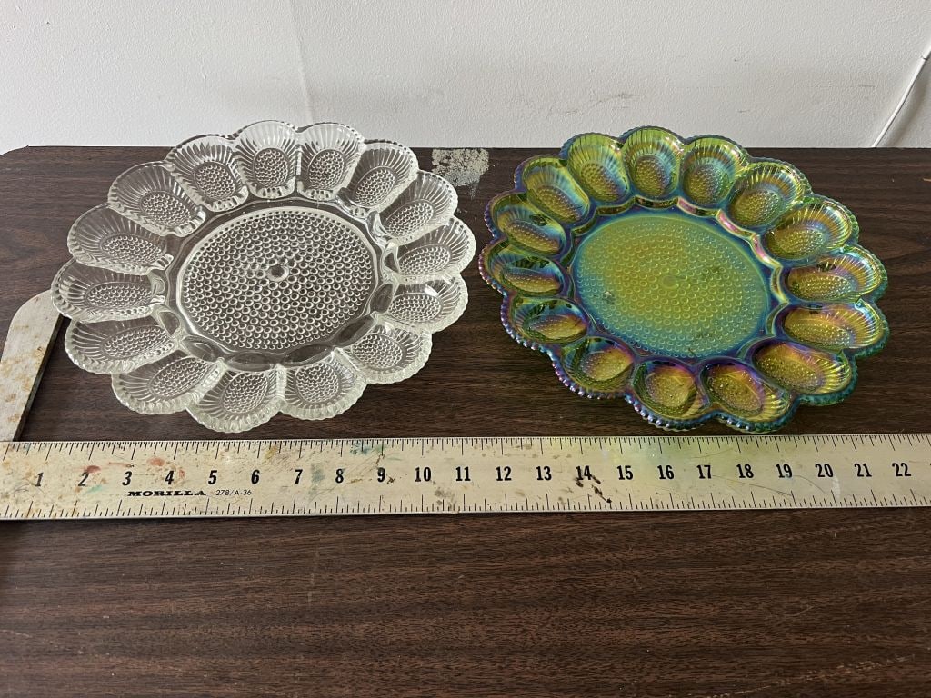 (2) Vintage deviled egg dishes: Irridescent green and clear, hobnail. Dimensions: Dia: 11.25" Condition: Presenting well.