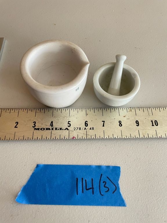 Small apothecary morter and pestle: No markings.