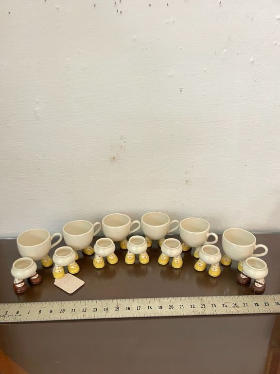 Carlton ware walking grouping: (7) egg cups and (6) coffee cups. Showing minor signs of age and use.