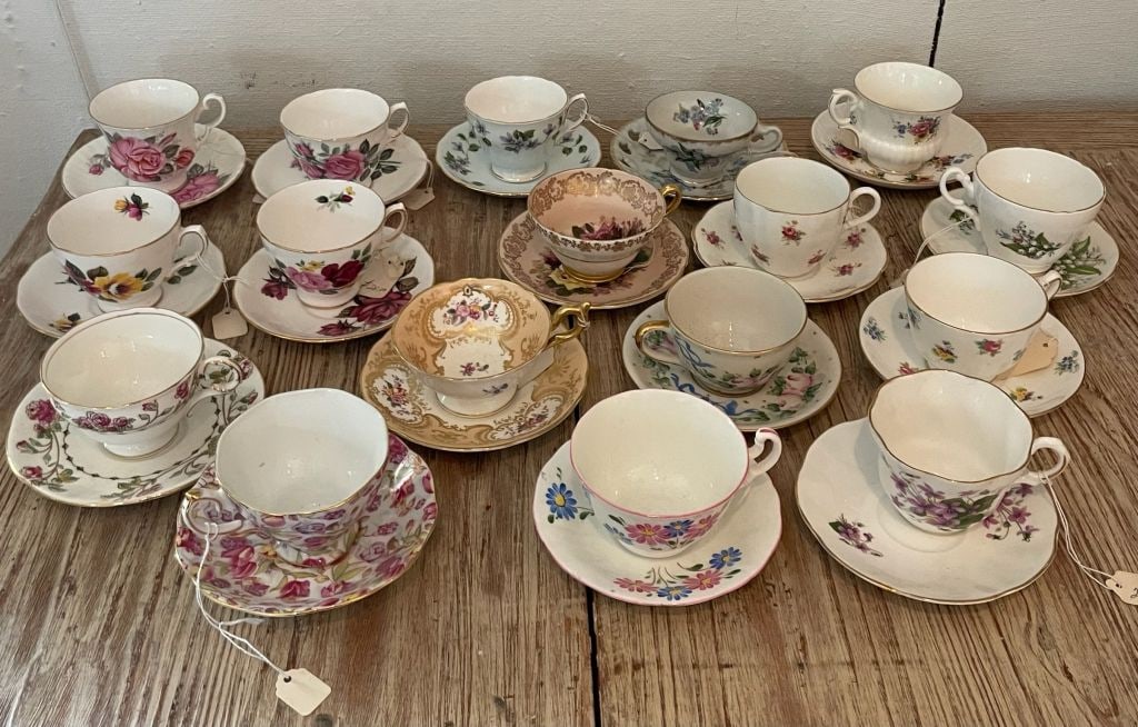 Grouping of tea cups: Porcelain, many brands, mostly English and floral or rose. Presenting well, only minor age and wear.