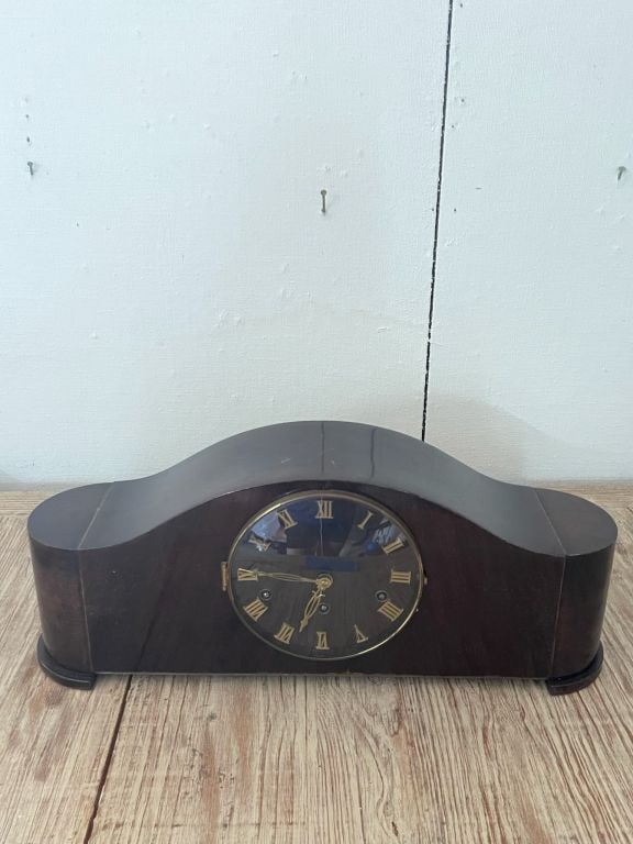 Art Deco mantle clock: With chime, clock winds but isnt tested for accuracy and doesnt come with key.