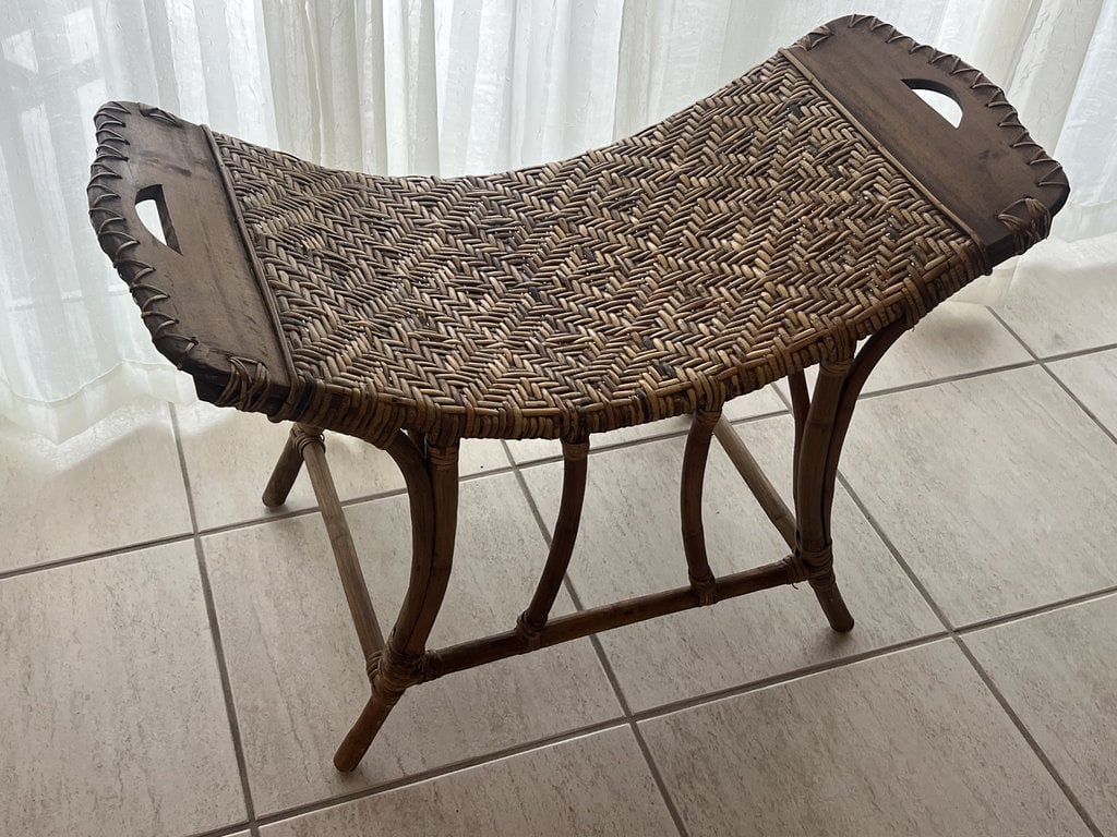 Bamboo Rattan Scoop Bench: Vintage, Florida style. Dimensions: H 24" x L 34" x D 16" Minor wear to edges and seat. Low Estimate: 50.00 High Estimate: 150.00