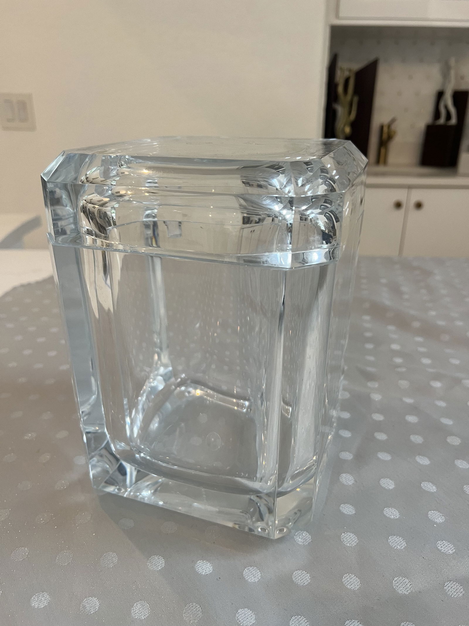 Chunky Vintage Lucite Ice Bucket: Mid-Century with swivel top. Dimensions: H 9" x W & D 7" Condition: Presenting well, only minor marks. Low Estimate: 100.00High Estimate: 250.00