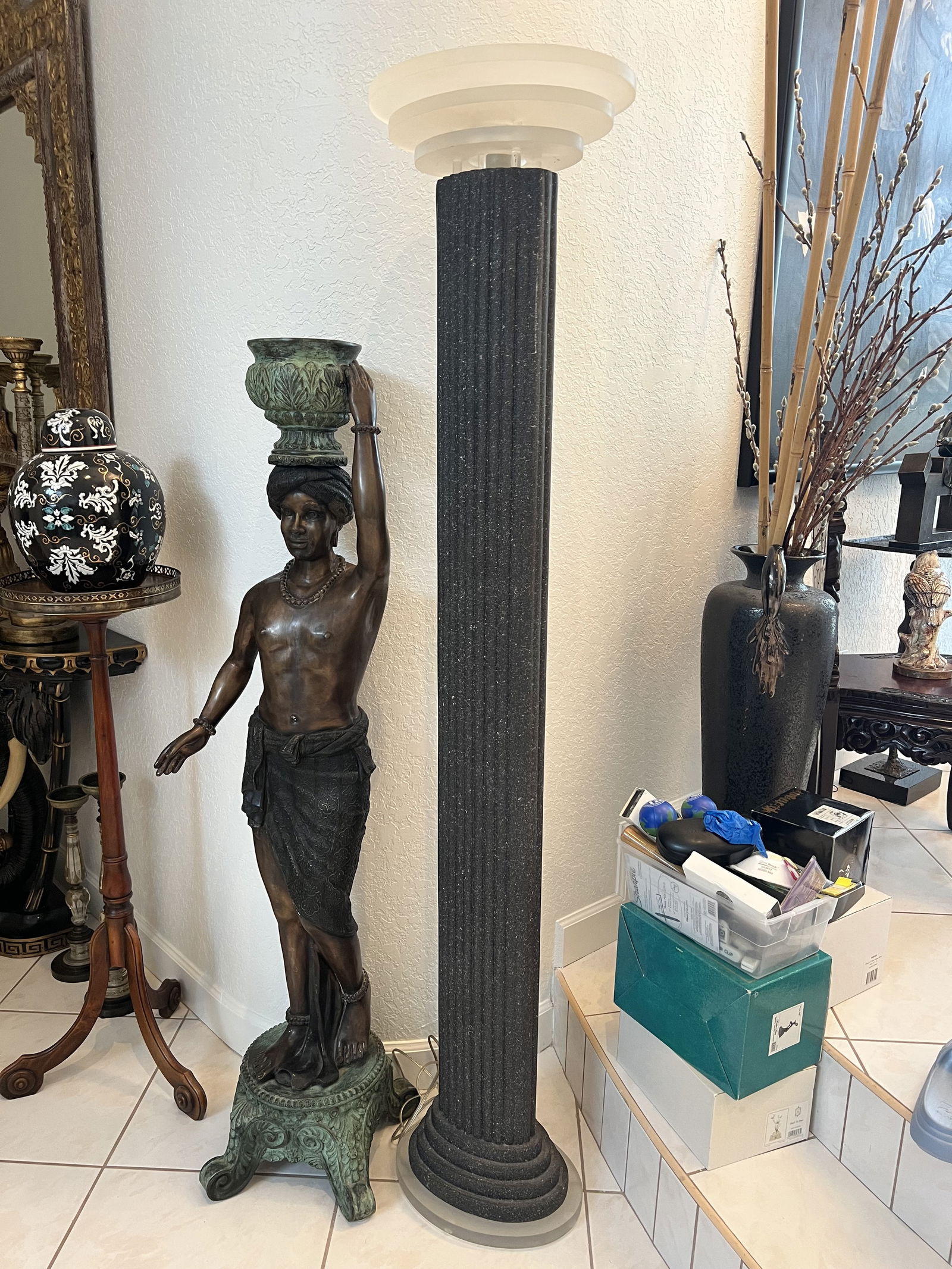 Vintage Pillar Floor Lamp: Frosted acrylic and speckled pillar. Dimensions: H 70" x W 15" x D 12" Condition: Wire needs spliced, minor rubs. Low Estimate: 200.00High Estimate: 300.00