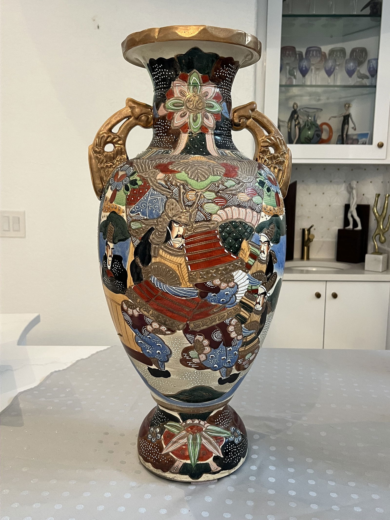 Vintage Japanese Satsuma Vase: Dimensions: H 24" x Dia: 12" Condition: Minor hairline at top. Low Estimate: 200.00High Estimate: 400.00