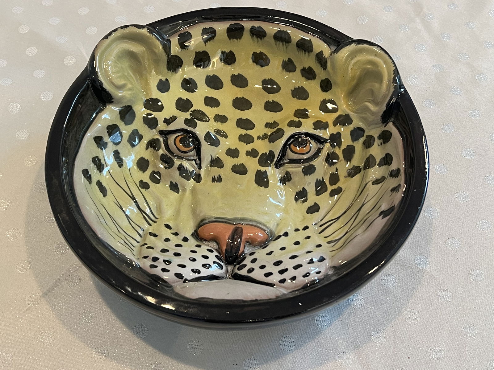 Vintage Terra Cotta Ceramic Leopard Bowl: Relief bowl with stunning colors. Dimensions: H 2.75" x Dia 10" Condition: Good vintage condition. High Estimate: 400Low Estimate: 200