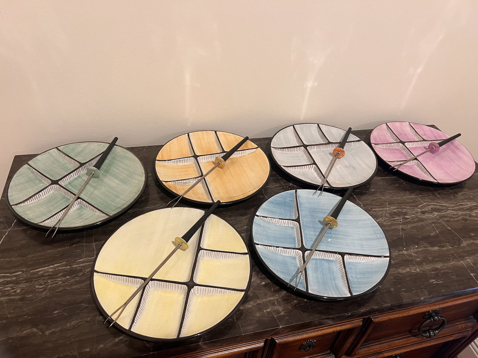 Burkart Handarbeit Swiss Fondue Plates & Forks: Mid-Century Modern Swiss or Danish modern handmade, divided, fondue plates and coordinating fondue forks. Dimensions: Dia: 9" Condition: Only normal, light signs of age. Only one very minor edge