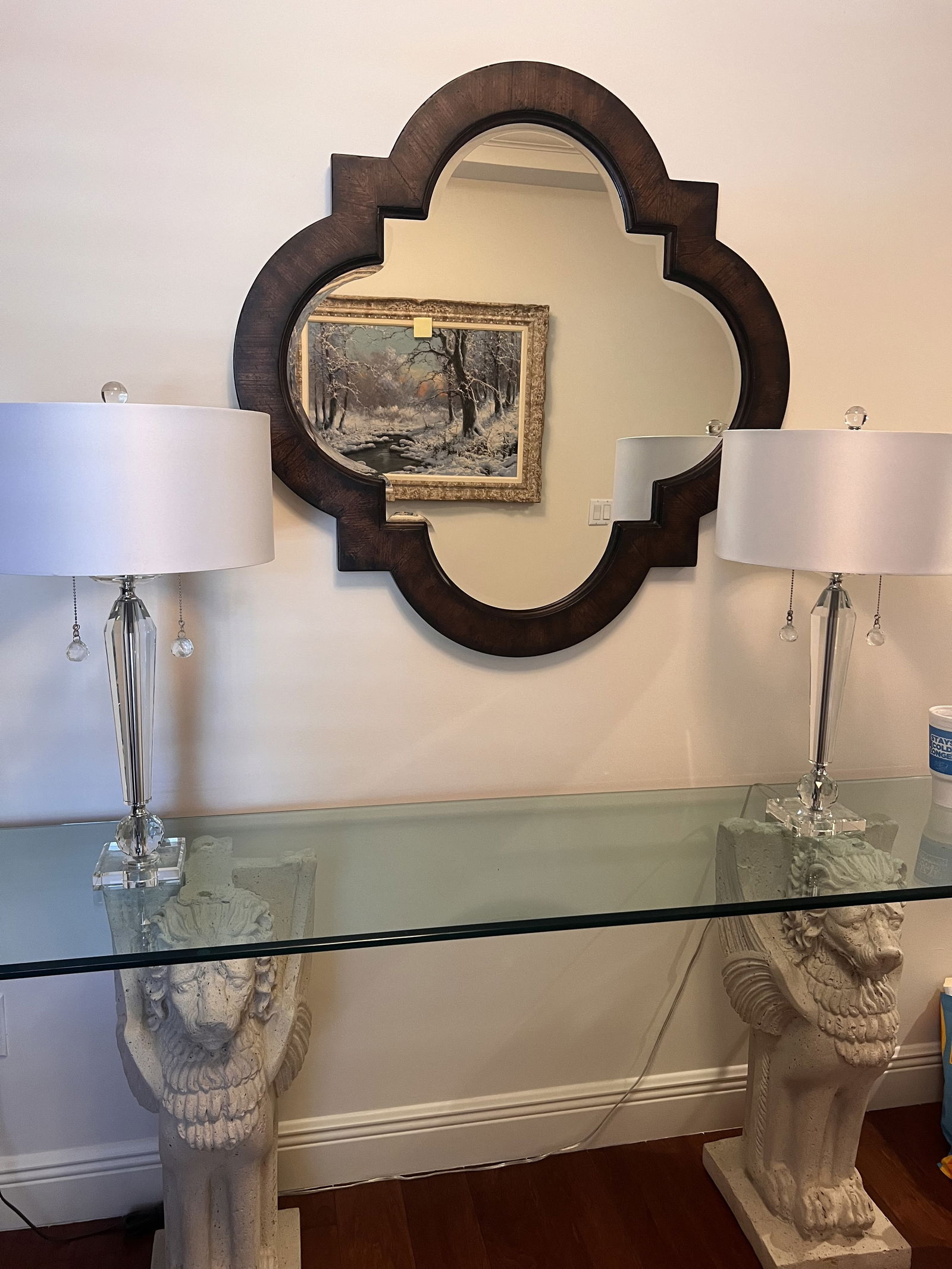 Quatrefoil Wall Mirror 39" Dark Wood: A, Ethan Allen, soild dark wood frame with lovely beveled mirror. Dimensions: Dia: 39" Condition: No issues to note Low Estimate: 10.00 High Estimate: 10000.00
