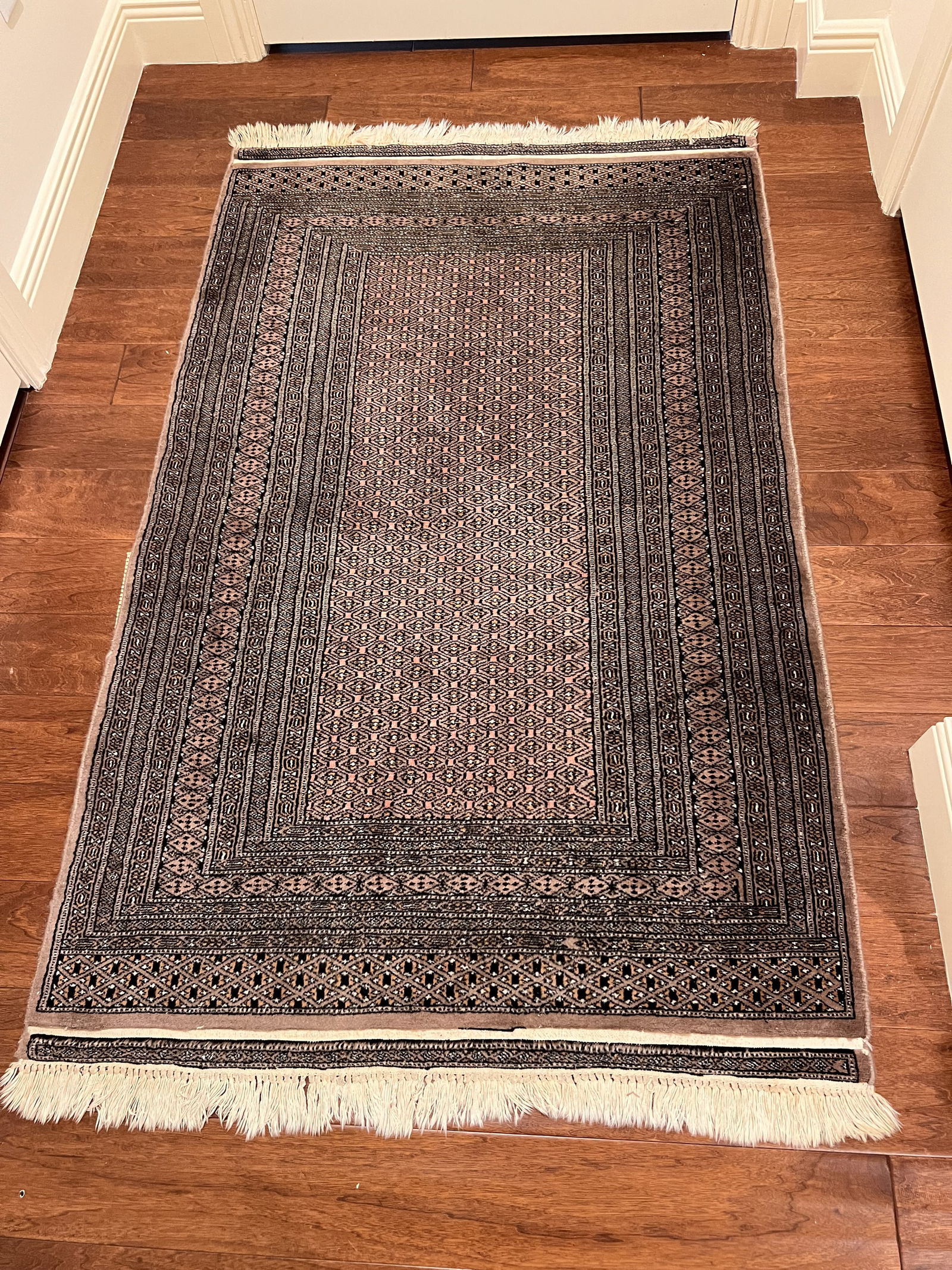 Vintage Wool Rug Bokhara: A vintage Persian wool rug. Dimensions: L 5' 6" x 3' 3" Condition: Used, normal signs of age. Home is very clean. Low Estimate: 10.00High Estimate: 10000.00