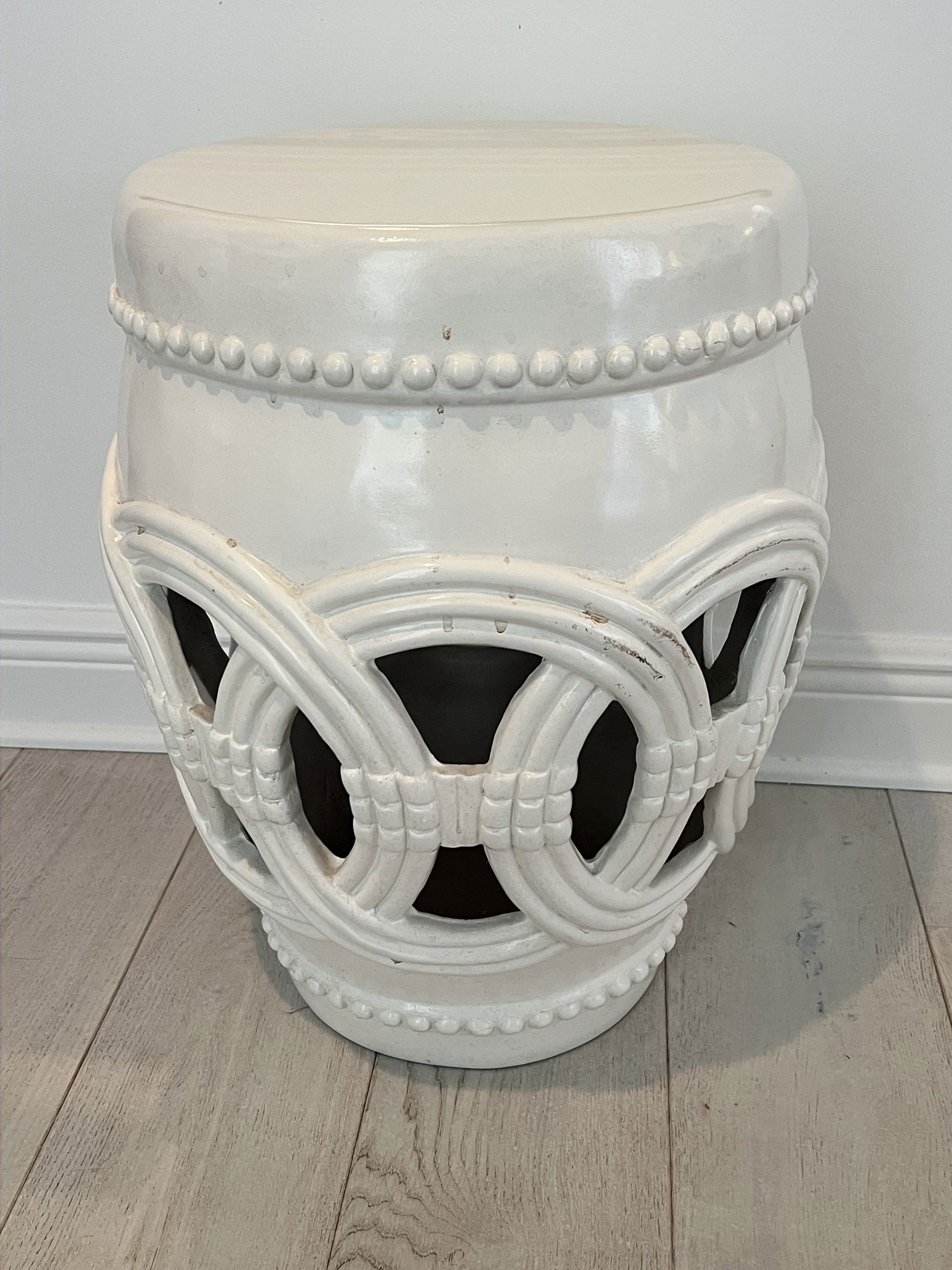 Single White Fiberglass Double Coin Garden Stool: A single fiberglass double coin or ring stools in a slightly off white (just a touch lighter than the pair in lot 1). Maker unknown, quality molded fiberglass. Dimensions: H 20.5" x Dia: 14"