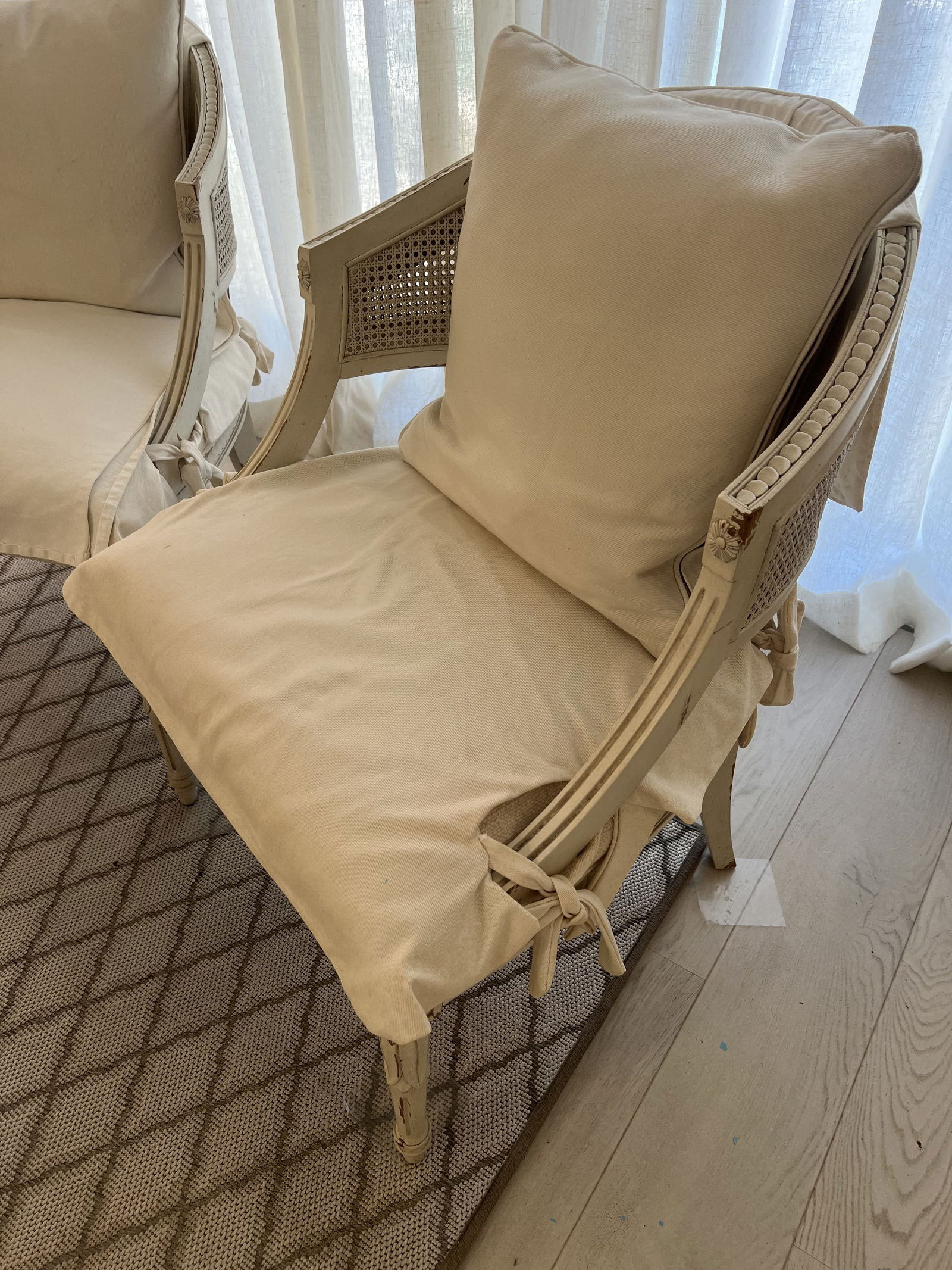 Pair of White Slipcovered French Louis XVI Cane Arm Chairs - 2