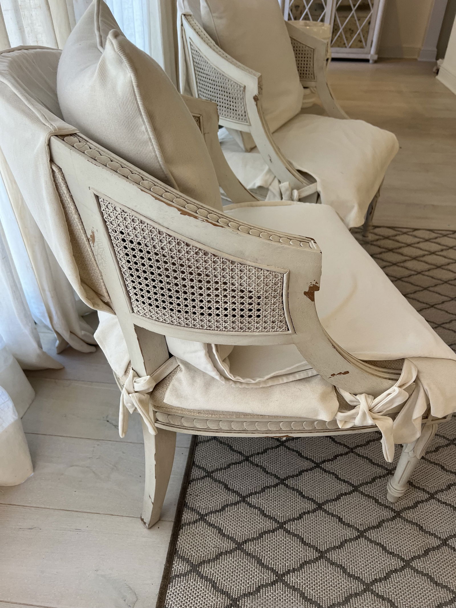 Pair of White Slipcovered French Louis XVI Cane Arm Chairs - 6