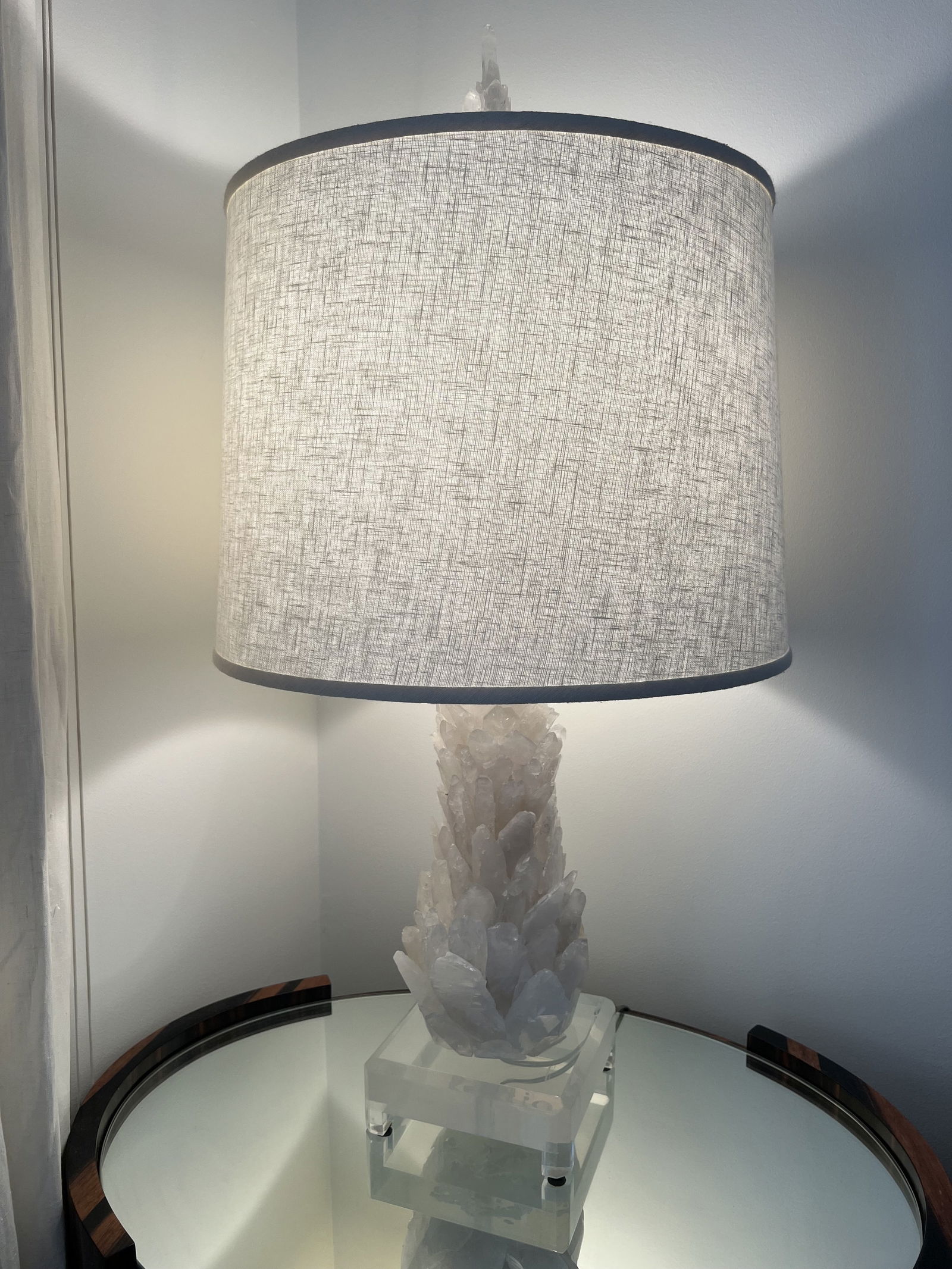 Pair of Rock Quartz Crystal Lamps: A pair of sculptural rock quartz crystal lamps with lucite bases. Large size measuring: H 39" x Base 8" square Shade: H 5" x Dia: 20" Condition: Very good, only minor signs of use including light