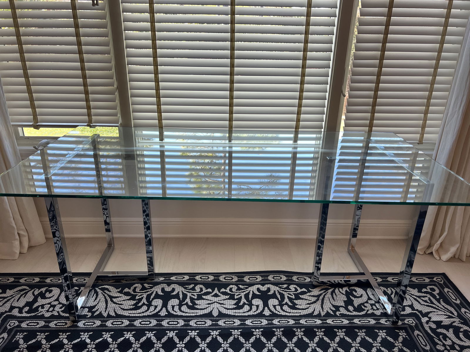 Mid- Century Style Chrome and Glass Top Desk or Dining Table: A CB2 dining table or conference desk. (plastic CB2 label on glass) Mid-Century style tubular chrome with thick, rectangular glass top. Dimensions: H 29.5" x L 72" x D 36" Condition: Presenting well.