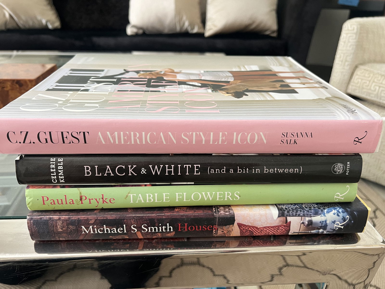 Lot of 4 Design Coffee Table Books: C.Z. Guest American Style Icon, Celerie Kemble Black and White, Paula Pryke Table Flowers, Michael S Smith Houses. Dimensions: Largest: L 12.5" x W 9.5" Condition: Presenting well. Low Estimate: