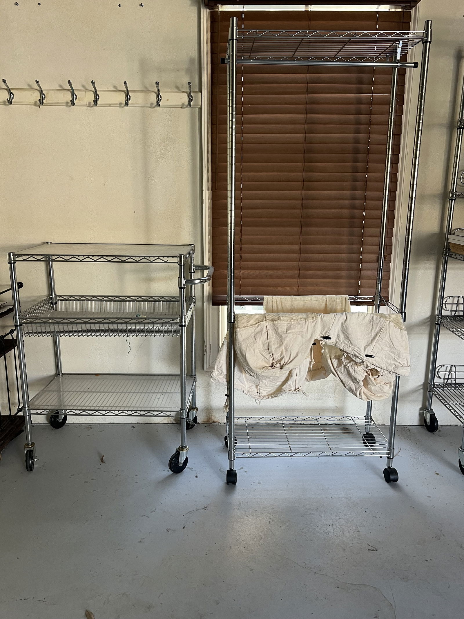 (2) Rolling Wire Shelves Including Laundry: Dimensions: Smaller: H 40.5" x L 34" x D 18" Condition: Used. Low Estimate: 10.00High Estimate: 10000.00