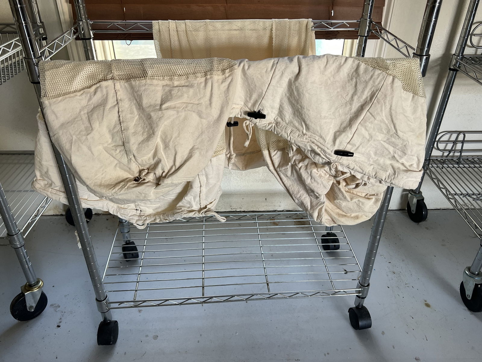 (2) Rolling Wire Shelves Including Laundry - 6