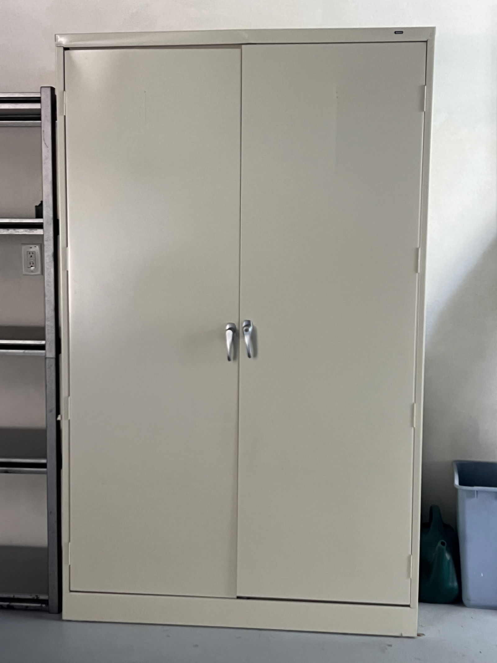 Tennsco Jumbo Locking Steel Garage Cabinet: Dimensions: H 78" x W 48" x D 24" Condition: Doors are slightly off, scraches to front. Working. Low Estimate: 10.00High Estimate: 10000.00