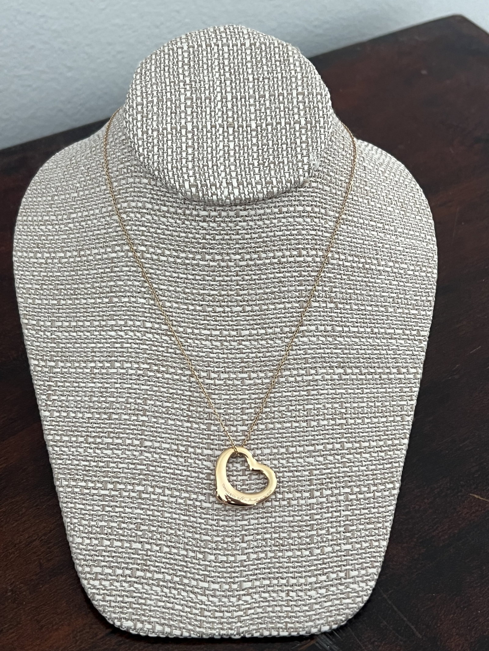 Elsa Peretti Tiffany & Co Rose Gold Open Heart Pendant Necklace: 18k rose gold by Elsa Peretti for Tiffany & Co. Fully hallmarked AU 750 for 18k gold as well as Tiffany & Co and Peretti. Dimensions: Necklace L 16" Pendant: 1" Weight: 7.6 dwt Condition: Very good,