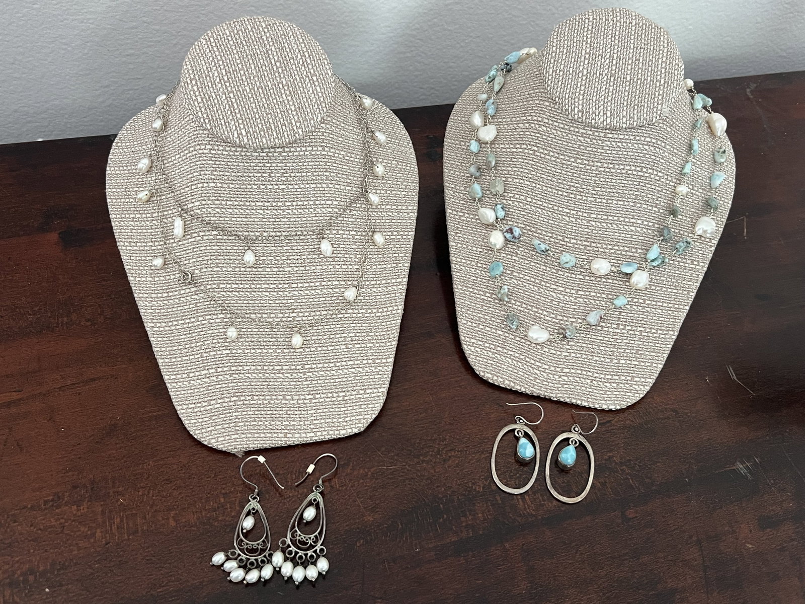 Sterling Silver and Pearl Jewelry Grouping: Two pairs of sterling silver earrings and two pearl necklackes. Great quality and trendy! Longest necklace measures 36". Weight: 114g Condition: Lightly used Low Estimate: 10.00 High Estimate: