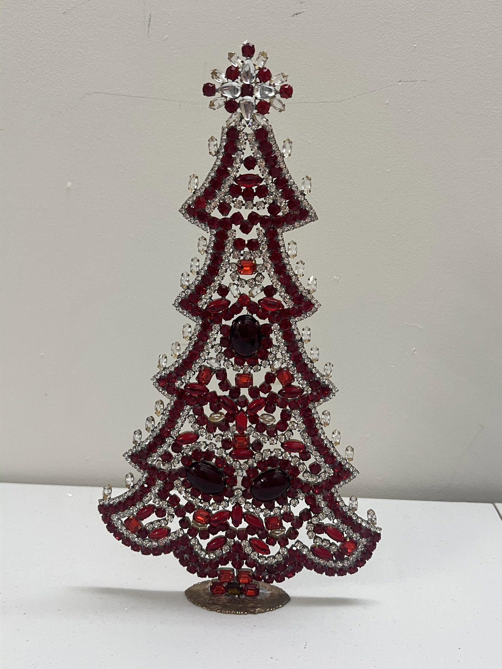 Vintage Czech Rhinestone Crystal Christmas Tree: Bijoux. Mostly red with large cabochon stones. Large size measuing 12.5" x 7" Condition: Very good. Low Estimate: 10.00 High Estimate: 10000.00