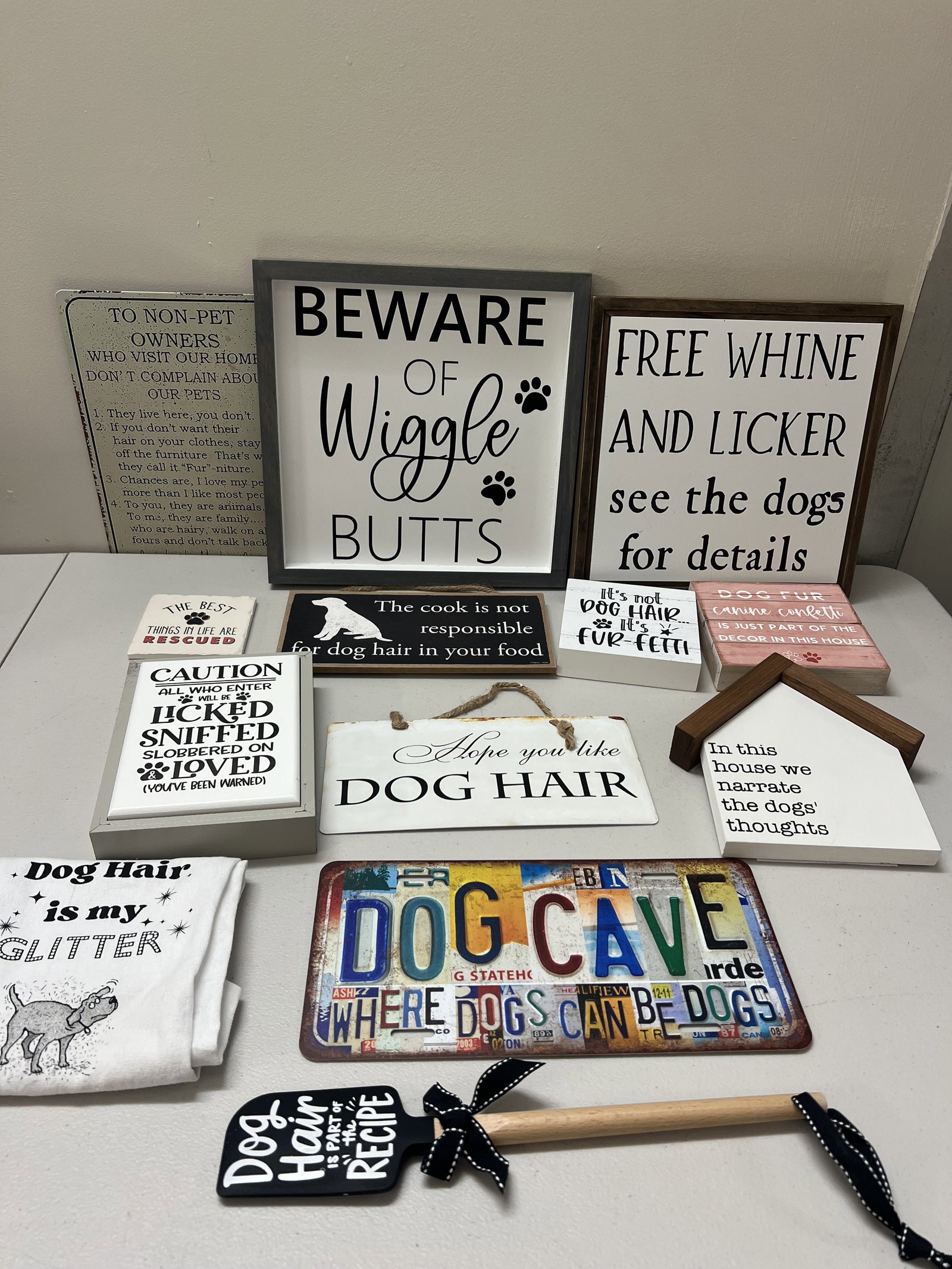 Collection of Dog Owner Signs: A nice collection of signs about dogs. Dimensions: Largest: 12" square. Condition: Signs of normal use. Low Estimate: 10.00 High Estimate: 10000.00