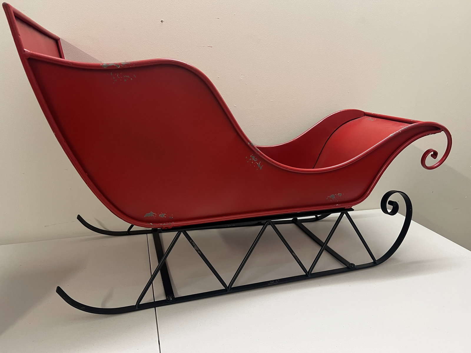 Large Metal Christmas Sleigh Display: Dimensions: L 39" x H 22" Condition: Some areas of distress, Low Estimate: 10.00 High Estimate: 10000.00