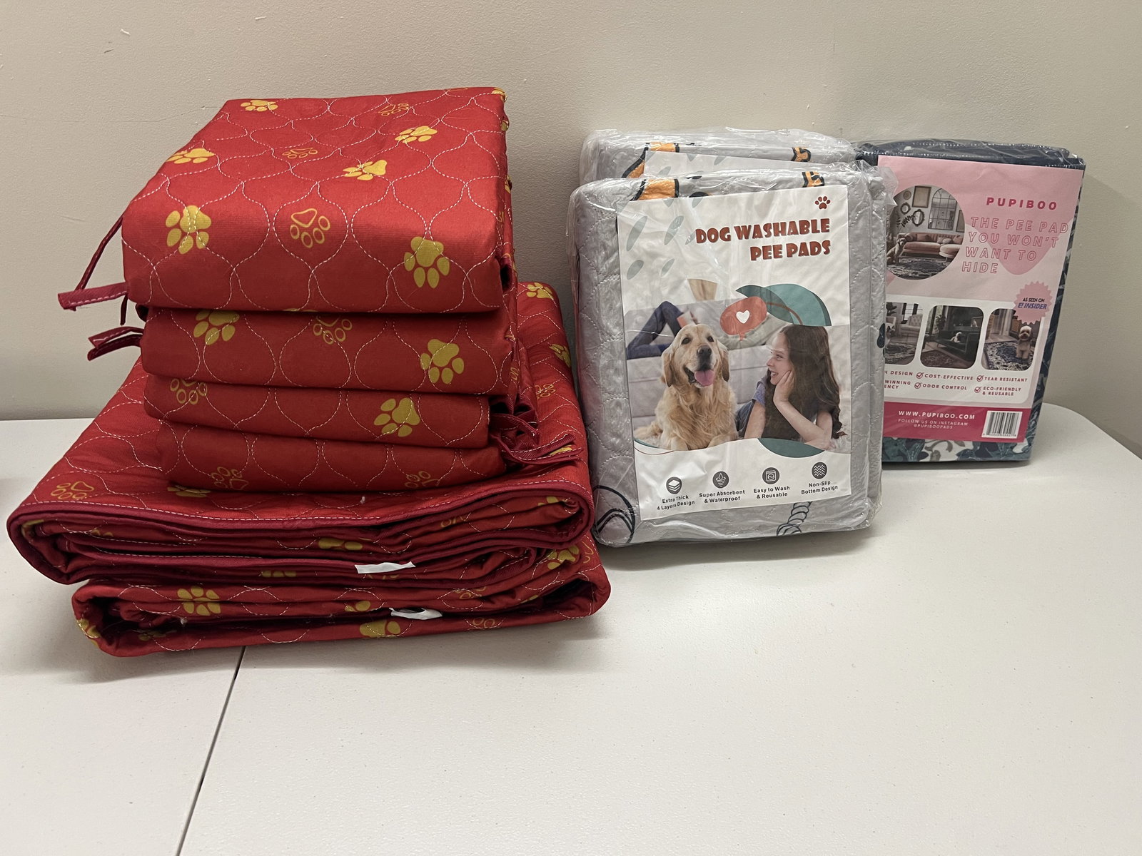 Dog Washable Pee Pads: (4) Small and fiver large. Condition: Some new in box, some lightly. Used and clean. Low Estimate: 10.00 High Estimate: 10000.00